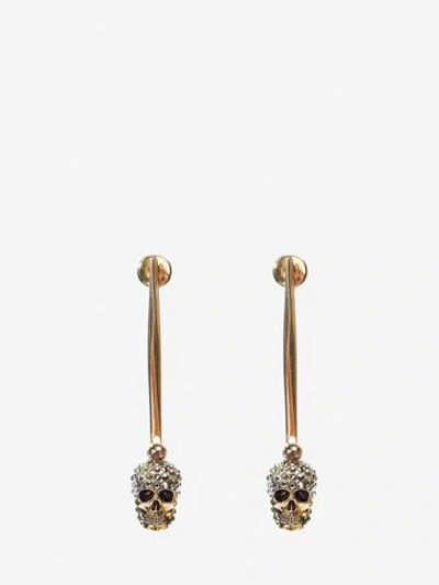 Shop Alexander Mcqueen Stick Skull Earrings In Gold
