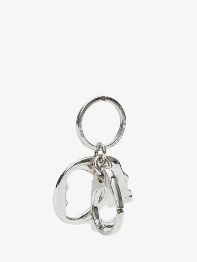 Shop Alexander Mcqueen Skull Keyring In Antique Silver