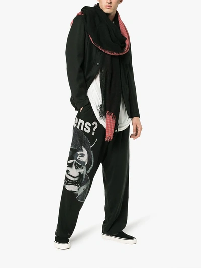 Shop Yohji Yamamoto Kurea Print Trousers In Black
