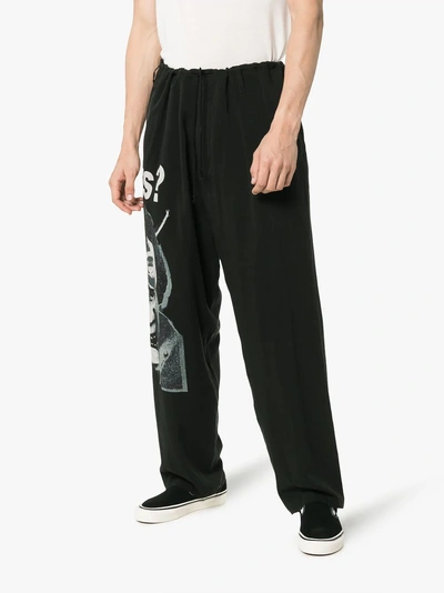 Shop Yohji Yamamoto Kurea Print Trousers In Black