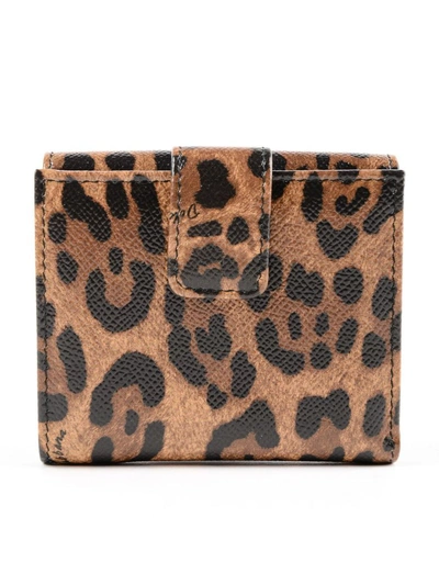 Shop Dolce & Gabbana St. Dauphine French Flap Wallet In M Leo Con Logo