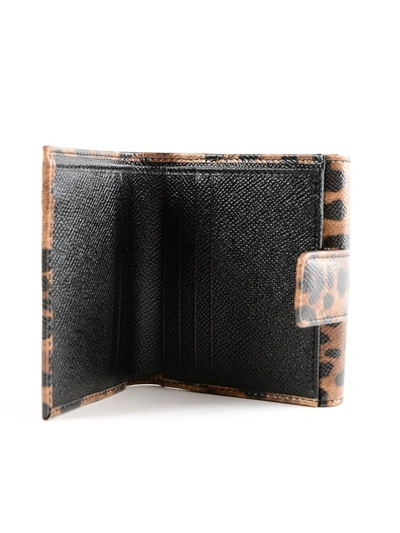 Shop Dolce & Gabbana St. Dauphine French Flap Wallet In M Leo Con Logo