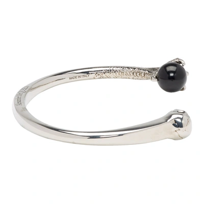 Shop Alexander Mcqueen Silver Skull And Claw Bracelet In 1001 Sil/bk