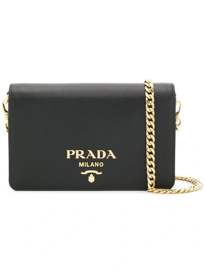 Shop Prada Textured Logo Clutch Bag - Black