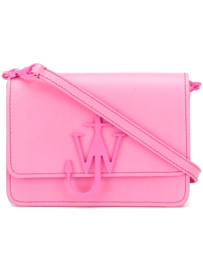 Shop Jw Anderson Mini Logo Crossbody Bag - Pink