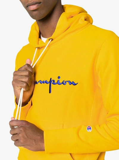 Shop Champion Kapuzenpullover Mit Logo In Yellow/orange