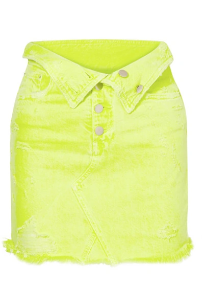 Shop Amiri Fold-over Distressed Denim Mini Skirt In Yellow
