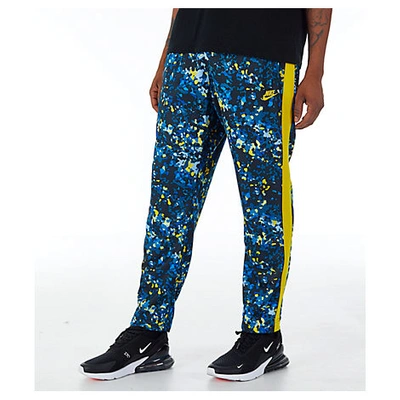 Shop Nike Men's Sportswear Camo Tribute Pants, Blue - Size Med
