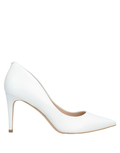Shop Guess Pumps In Ivory