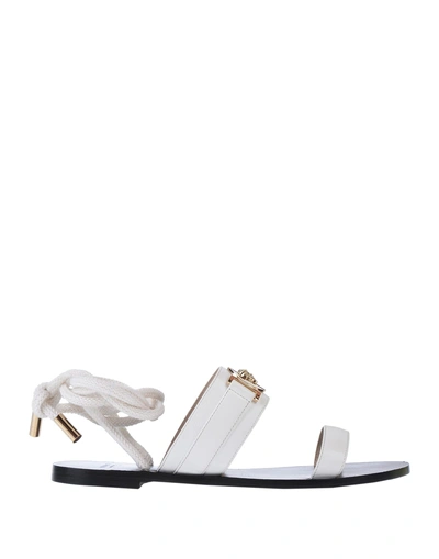 Shop Versace Sandals In White