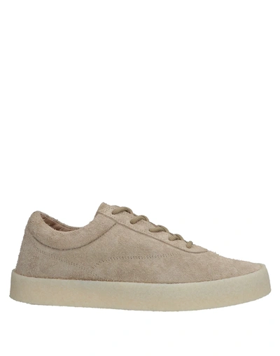 Shop Yeezy Sneakers In Beige