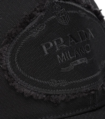 Shop Prada Embroidered Cotton Cap In Black