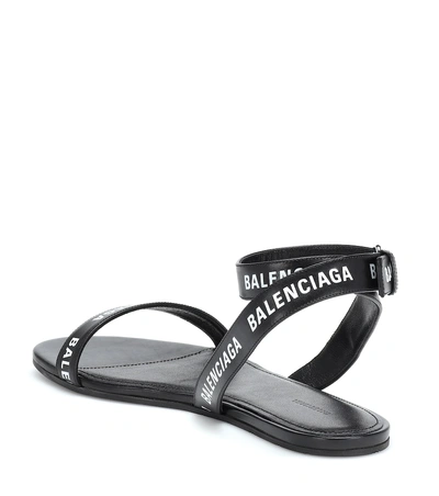Shop Balenciaga Printed Leather Sandals In Black