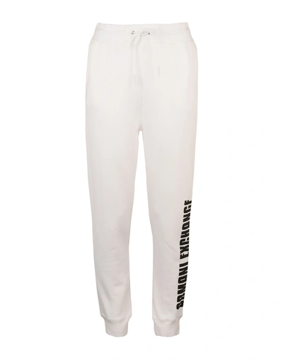 Shop Armani Exchange Casual Pants In White