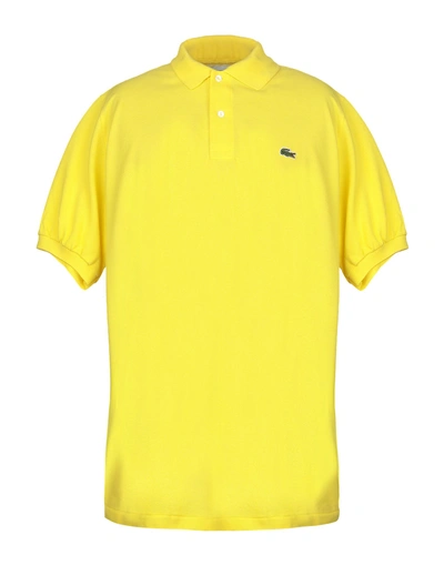 Shop Lacoste Polo Shirts In Yellow