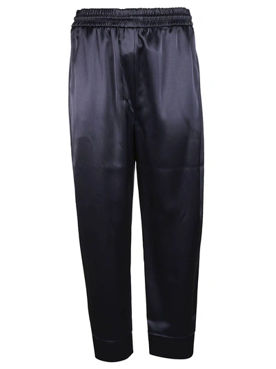 Shop Nanushka Elasticated Trousers In Blue