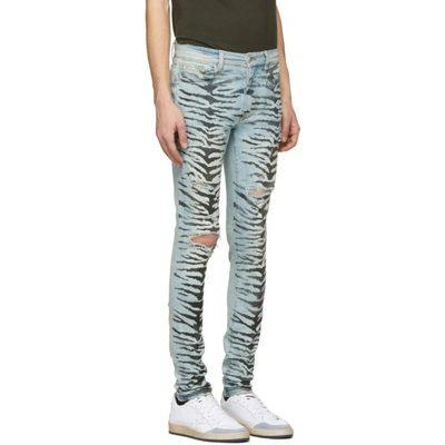 Shop Amiri Indigo Tiger Destruction Jeans In Ils Indigo