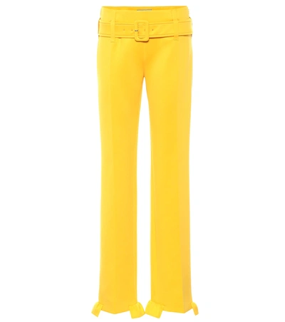 Shop Prada Belted Technical Jersey Trousers In Yellow