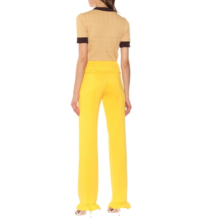 Shop Prada Belted Technical Jersey Trousers In Yellow