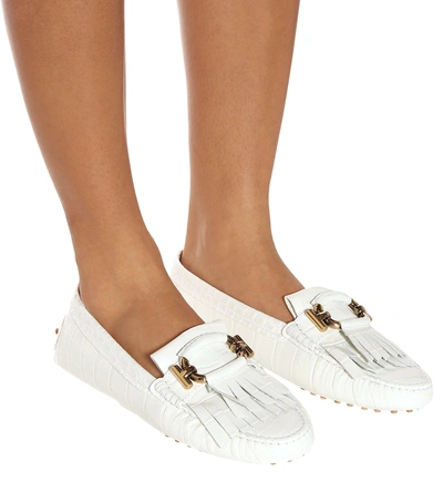 Shop Tod's Gommino Embossed Leather Loafers In White