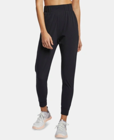 Shop Nike Bliss Dri-fit Training Pants In Black