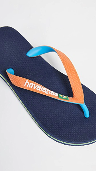 Shop Havaianas Brazil Mix Flip Flops In Navy Blue/neon Orange
