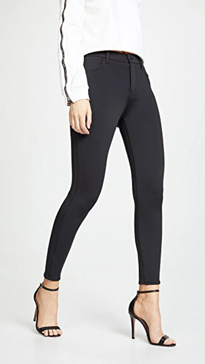 Shop J Brand Alana High Rise Skinny Pants In Black