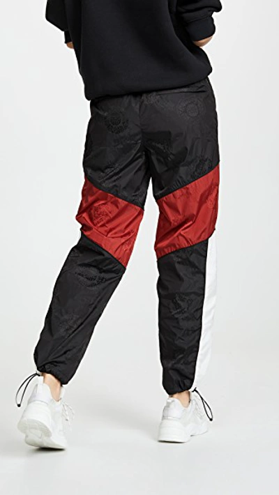 Shop Alexander Wang Winbreaker Track Pants With Elastic Waistband In Black/white/red