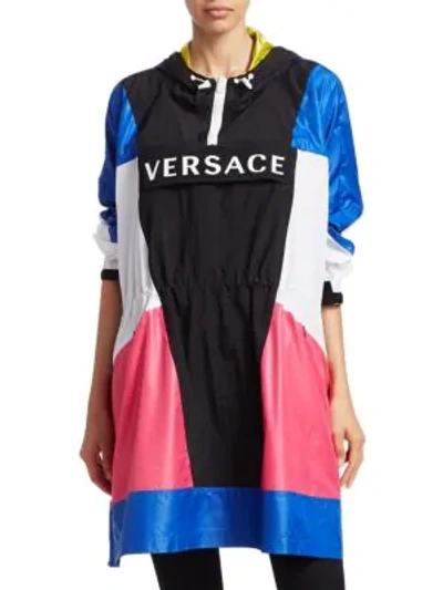 Shop Versace Long-sleeve Logo Colorblock Poncho In Blue