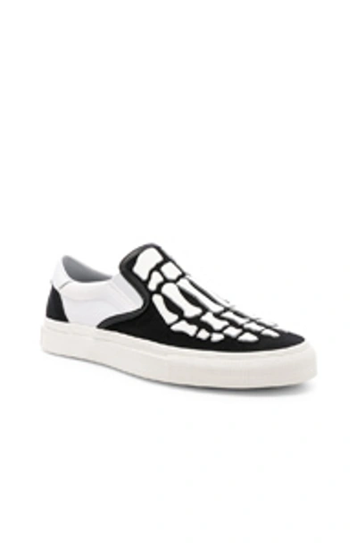 Shop Amiri Slip On Bones Sneaker In Black & White