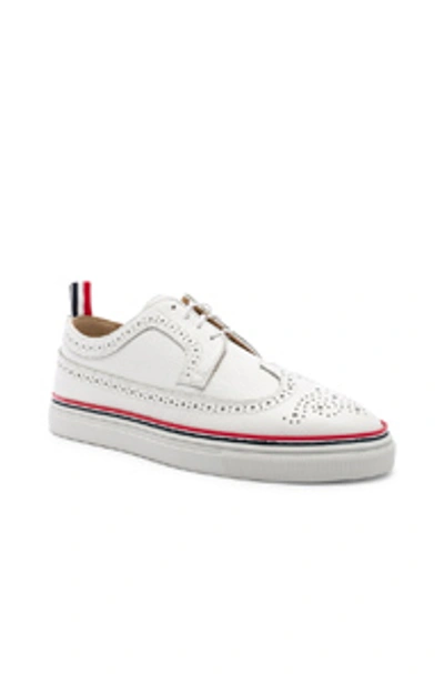 Shop Thom Browne Brogue Sneaker In White