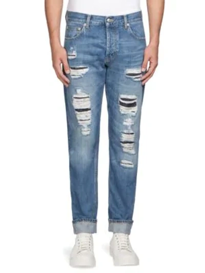 Shop Alexander Mcqueen Distressed Straight-leg Jeans In Blue Washed