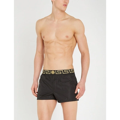 Shop Versace Iconic Shell Swim Shorts In Black Gold