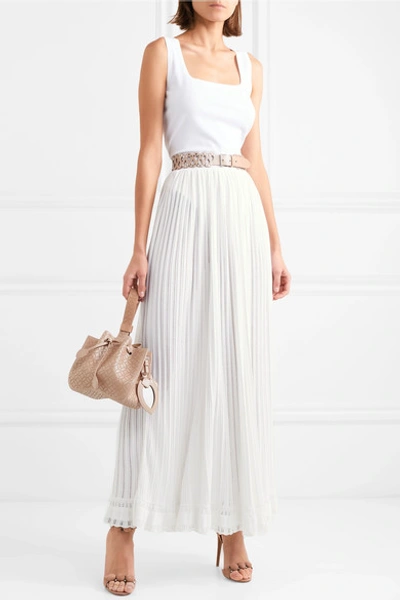 Shop Alaïa Ribbed Pleated Knitted Skirt In White