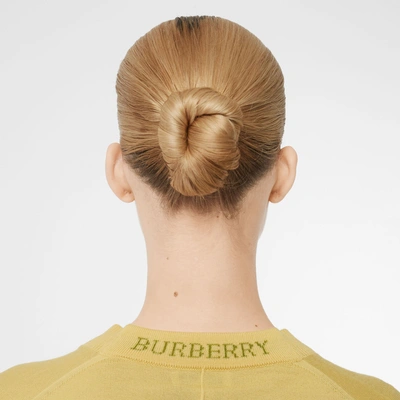 Shop Burberry Logo Detail Merino Wool Cardigan In Primrose Yellow