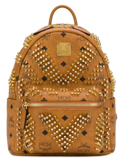 Shop Mcm Embellished Monogram Backpack - Brown