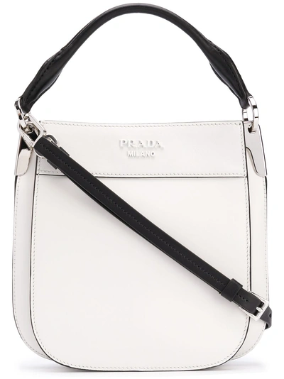 Shop Prada Front Logo Messenger Bag - White