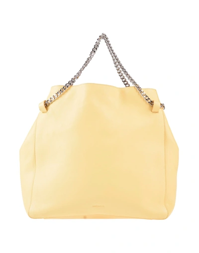 Shop Jil Sander Handbag In Yellow