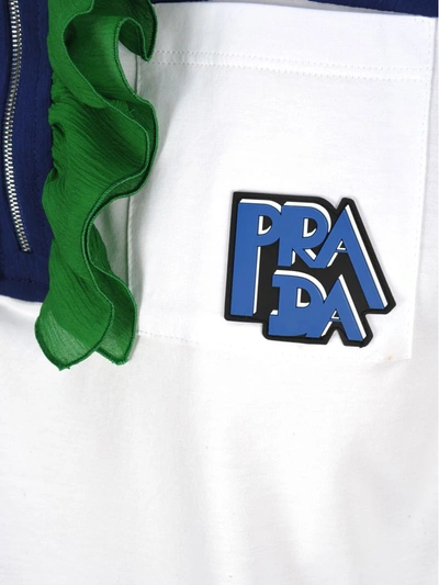 Shop Prada Ruffled Detail Polo Shirt In White + Ink + Green