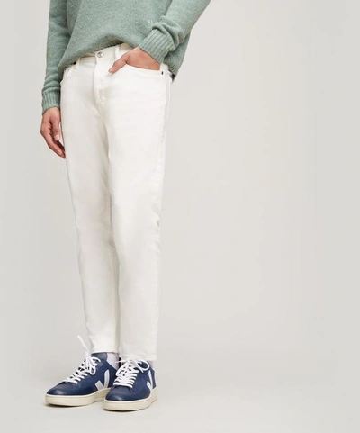 Shop Acne Studios River White Jeans