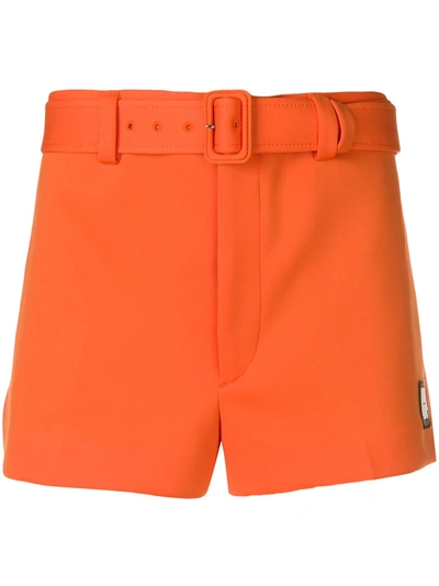 Shop Prada Belted Logo Shorts - Orange