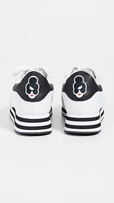 Shop Alice And Olivia Magman Sneakers In White/ Black