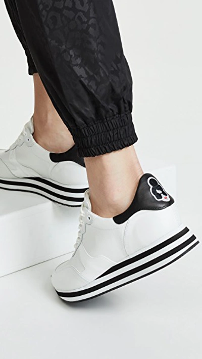 Shop Alice And Olivia Magman Sneakers In White/ Black