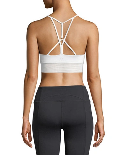 Shop Alo Yoga Lush Strappy-back Sports Bra In White Glossy/wht