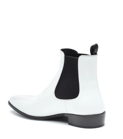 Shop Prada Leather Ankle Boots In White
