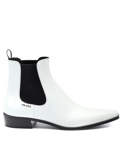 Shop Prada Leather Ankle Boots In White