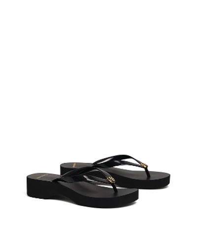 Shop Tory Burch Carved Wedge Flip-flop In Black