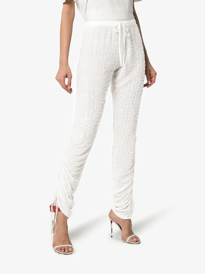 Shop Ashish Sequin Embellished Track Pants In 114 - White