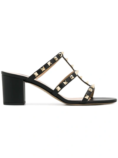 Shop Valentino Rockstud Detail Mules - Black