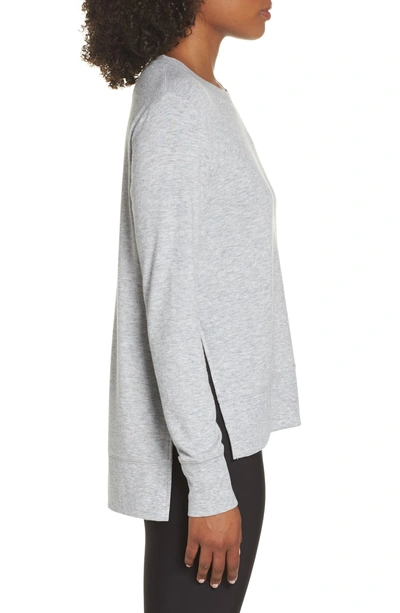 Shop Alo Yoga 'glimpse' Long Sleeve Top In Dove Grey Heather